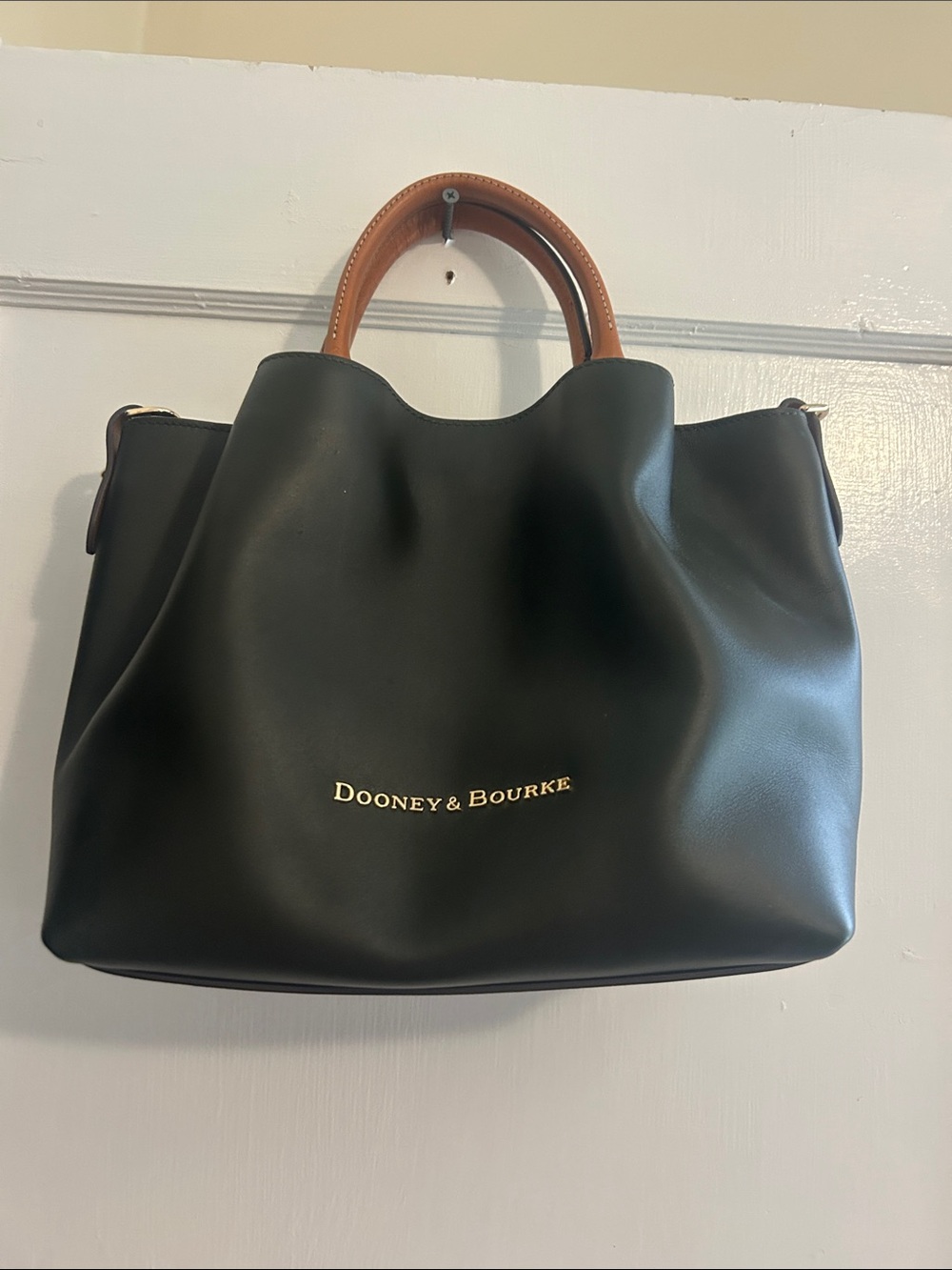 Dooney & Bourke Black Leather Tote with Brown Handles and Gold Logo